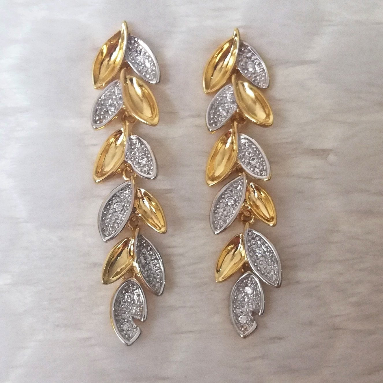 Aretes Hojitas - Baño de Oro 18K