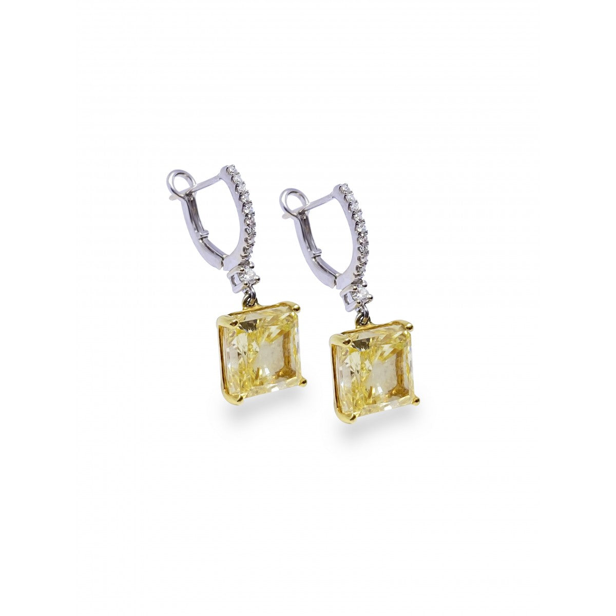 ARETES 18 K OB .22CT CANARIO